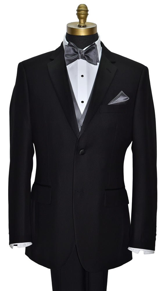 mannequin wearing a black tuxedo with a white shirt and a charcoal "tie-yourself" bow tie against a white background