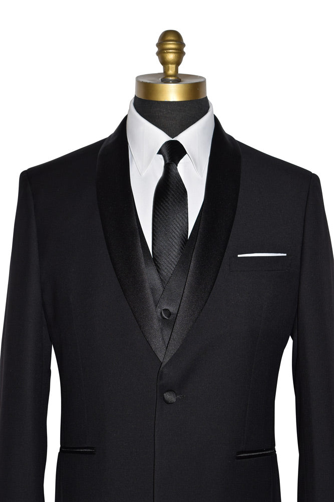 close up front view  Black shawl collar tuxedo , with long black dress tie and a black vest.