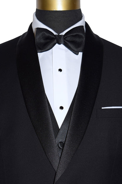 close up front view of Black shawl collar tuxedo, with white lay-down collar tuxedo shirt and black satin bowtie with a black vest