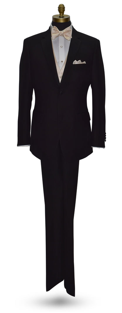 life size mannequin wearing a black notch-lapel tuxedo with a champagne bowtie and champagne vest against a white background