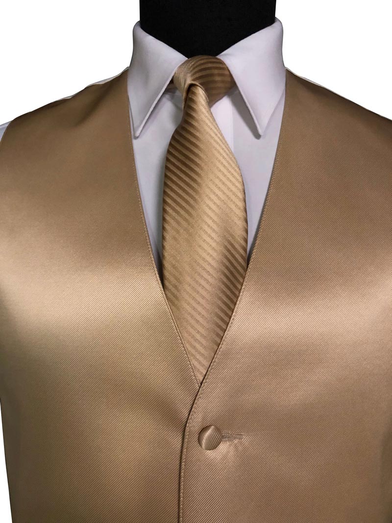 close-up Gold vest over a white shirt with a matching gold tie with a subtle stripe on a white background
