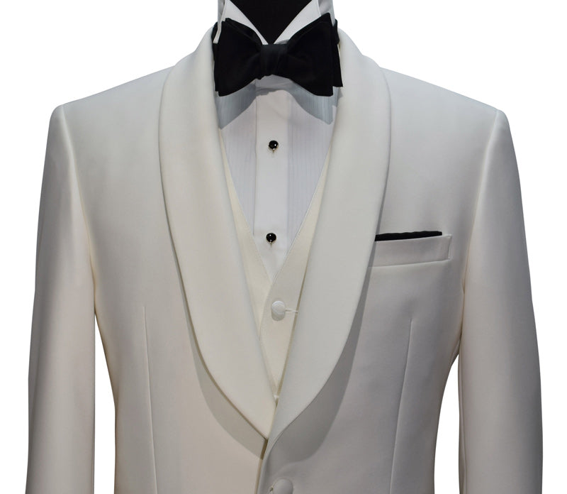 close-up mannequin wearing ivory shawl collar tuxedo with ivory vest and black "tie-yourself" bowtie against a white background 