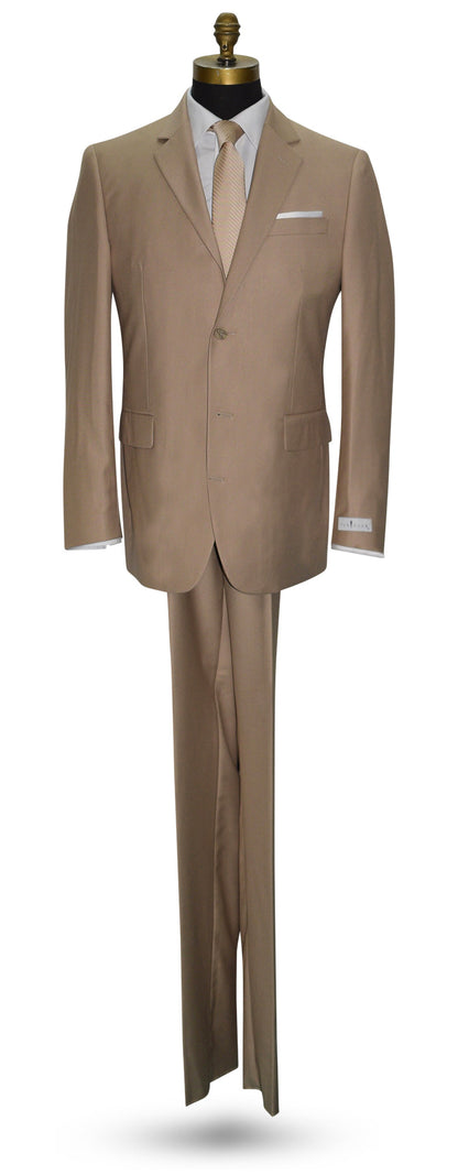 life size mannequin wearing a tan suit with a white dress shirt and a champagne colored necktie
