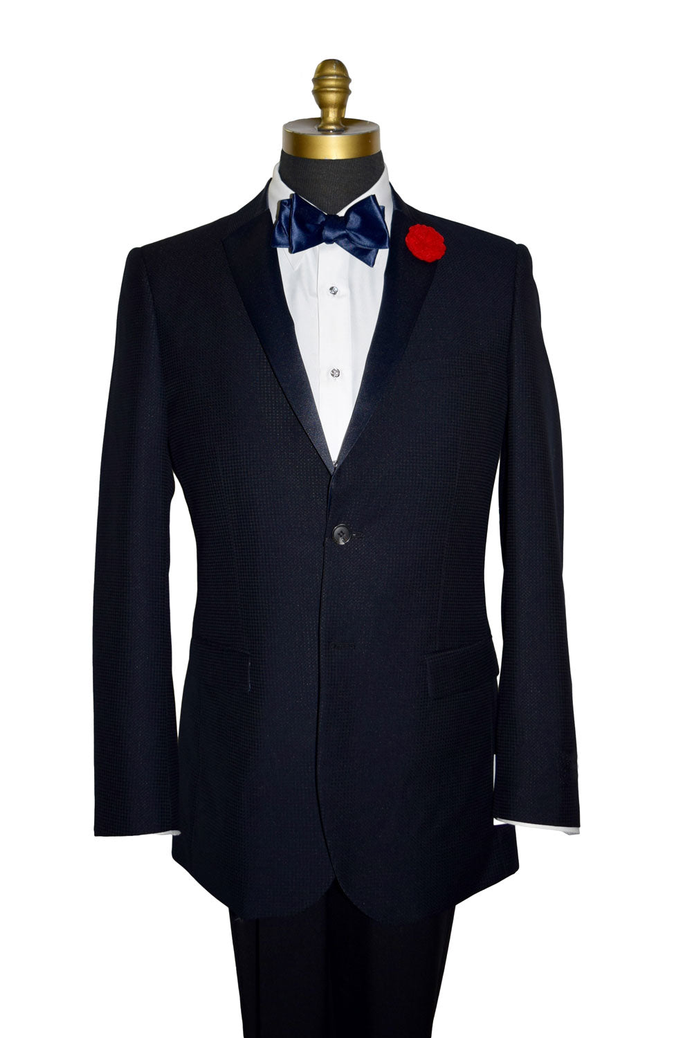 close-up Life size mannequin wearing a navy blue tuxedo jacket with a navy blue satin tie-yourself bowtie.