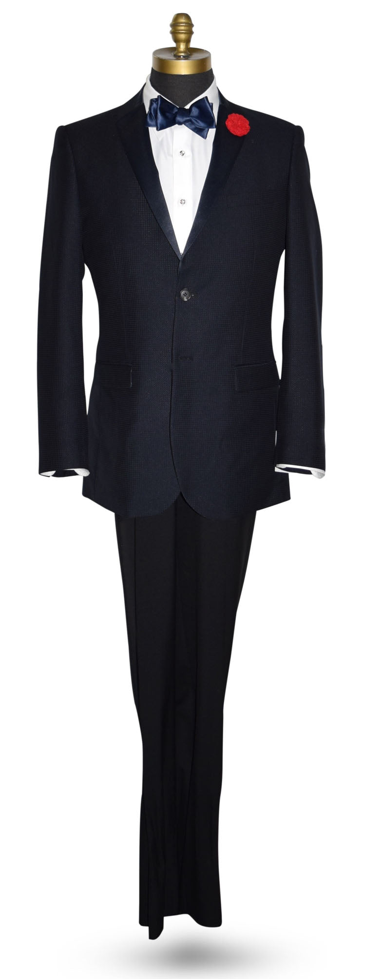 Life size mannequin wearing a navy blue tuxedo jacket with a navy blue satin tie-yourself bowtie.