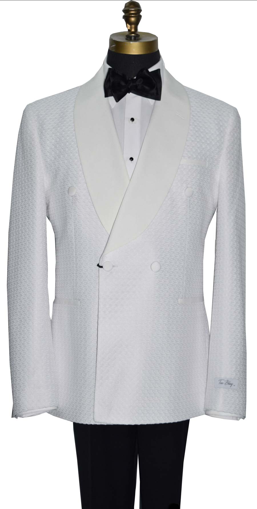 close-up off-white double breasted tuxedo jacket on a mannequin with a black bow tie against a white background