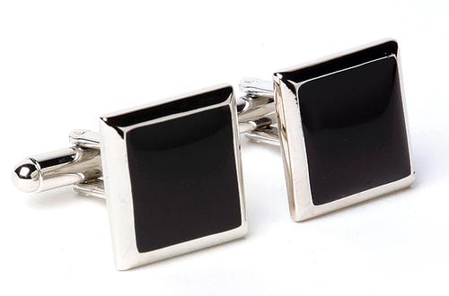 Black square ONYX cufflinks with silver borders on a white background