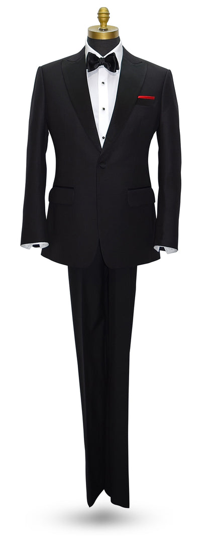 Black peak lapel tuxedo with white shirt and bow tie on a mannequin against a white background