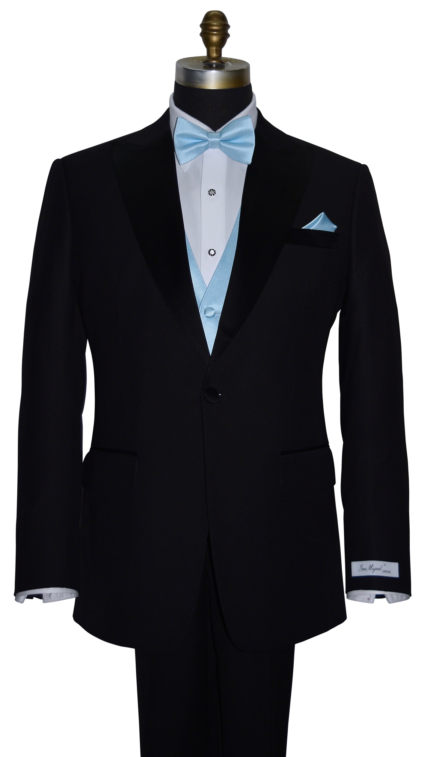 black peak lapel tuxedo with a white tuxedo shirt and a capri-blue bowtie and capri-blue vest with mother-of-pearl-formal jewelry on a mannequin against a white background