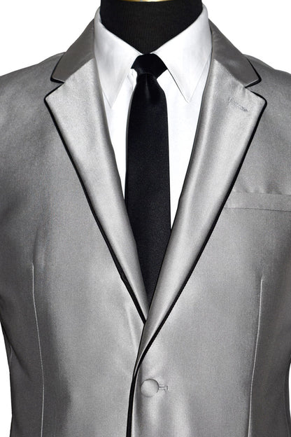 very close-front view mannequin wearing a silver Versace suit coat with black pants and a black necktie against a white background