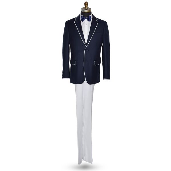 Versace Navy Suit coat with white pants and a navy blue bowtie against a white background