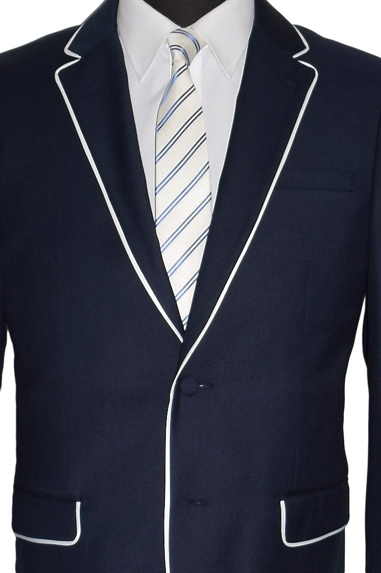 Navy suit jacket with white trim and a striped tie on a white background