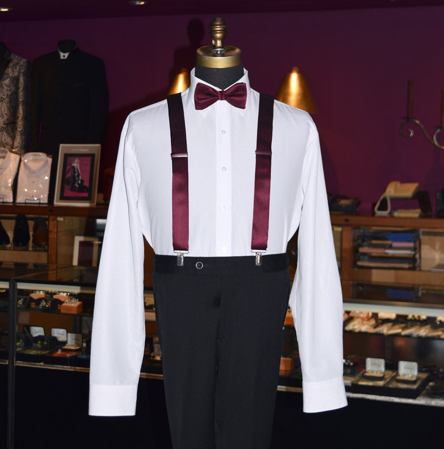 wine color satin suspenders and bowtie on a mannequin at tuxclub