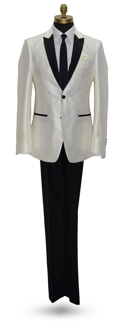 life size mannequin wearing a winter white tuxedo with black lapels wearing a black skinny necktie and black tuxedo pants on a mannequin against a white background