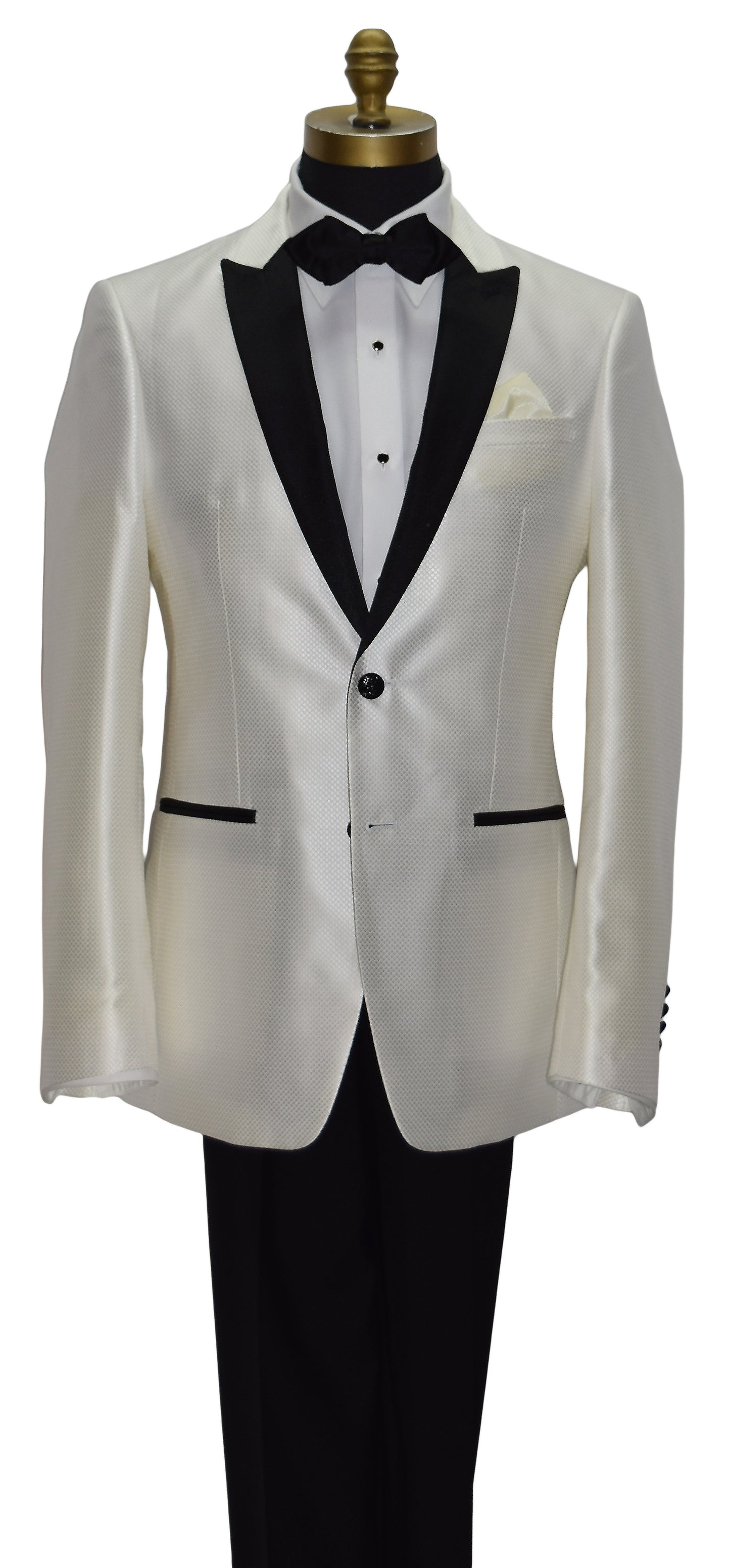 White tuxedo with black lapels wearing a black diamond tipped bowtie on a mannequin against a white background