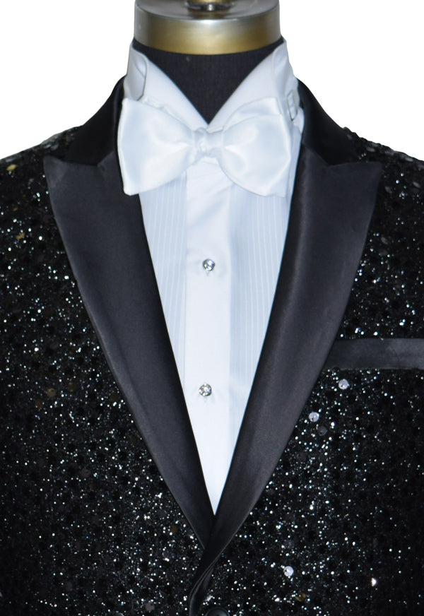 very close-up Black sequins tuxedo with white bow tie on a mannequin against a white background