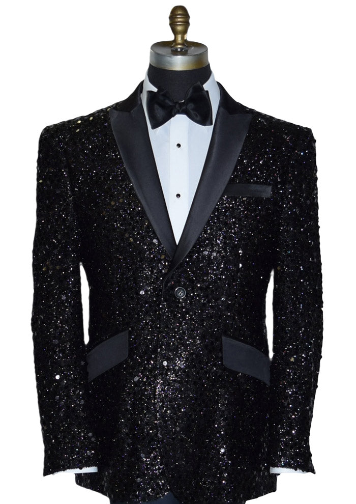 Black sequin tuxedo on a mannequin with a white shirt and black bow tie.