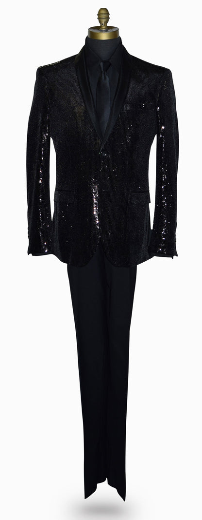 life size mannequin wearing a black sequin shawl collar tuxedo with a black shirt and black necktie against a white background