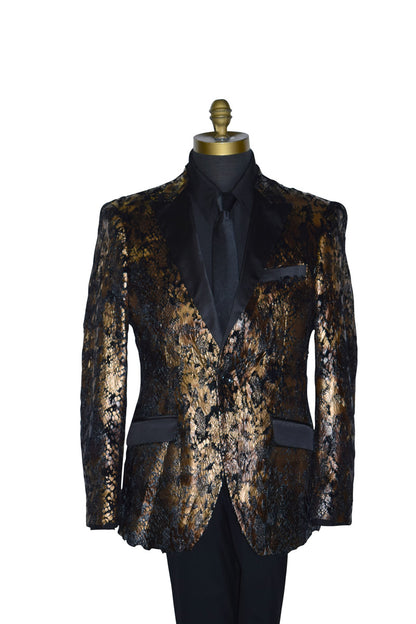 close-up life size mannequin wearing a gold and black tuxedo with a black shirt and black long necktie against a white background-up 