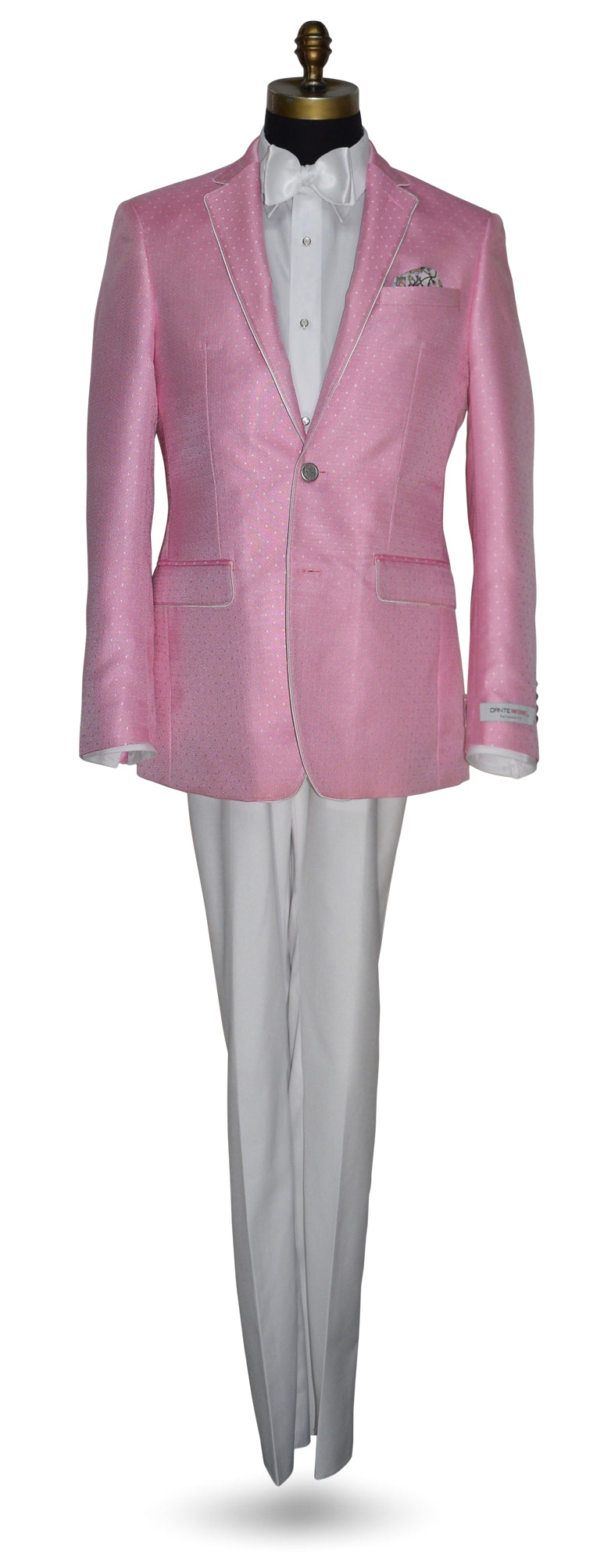 mannequin wearing a pink dinner jacket with white pants a white shirt and white bowtie