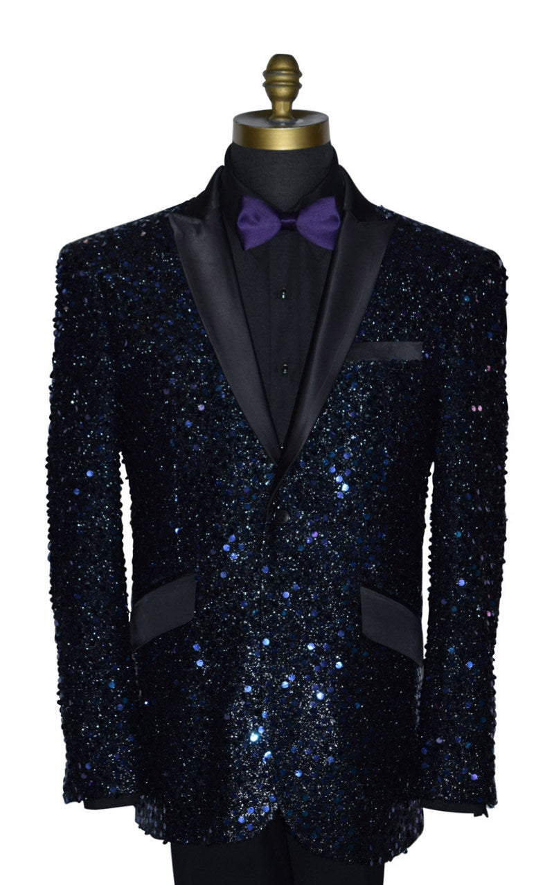 close-up Black and purple sequin tuxedo on a mannequin wearing a black shirt and purple bowtie against a white background