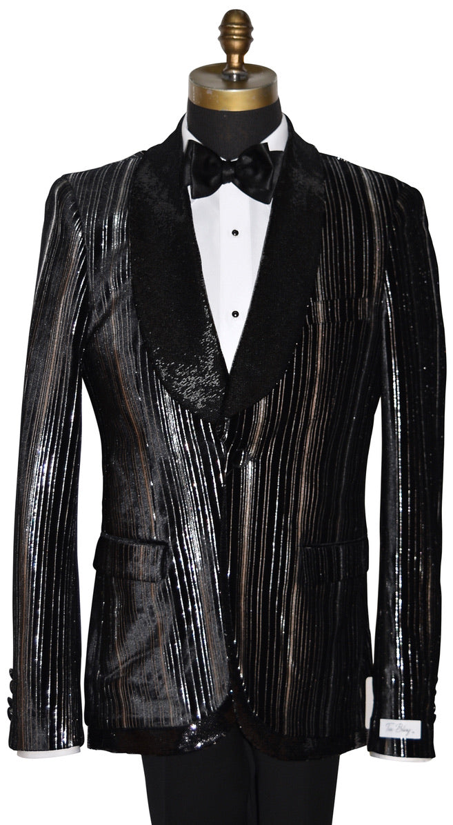 Black sequins tuxedo with shawl collar on a mannequin against a white background
