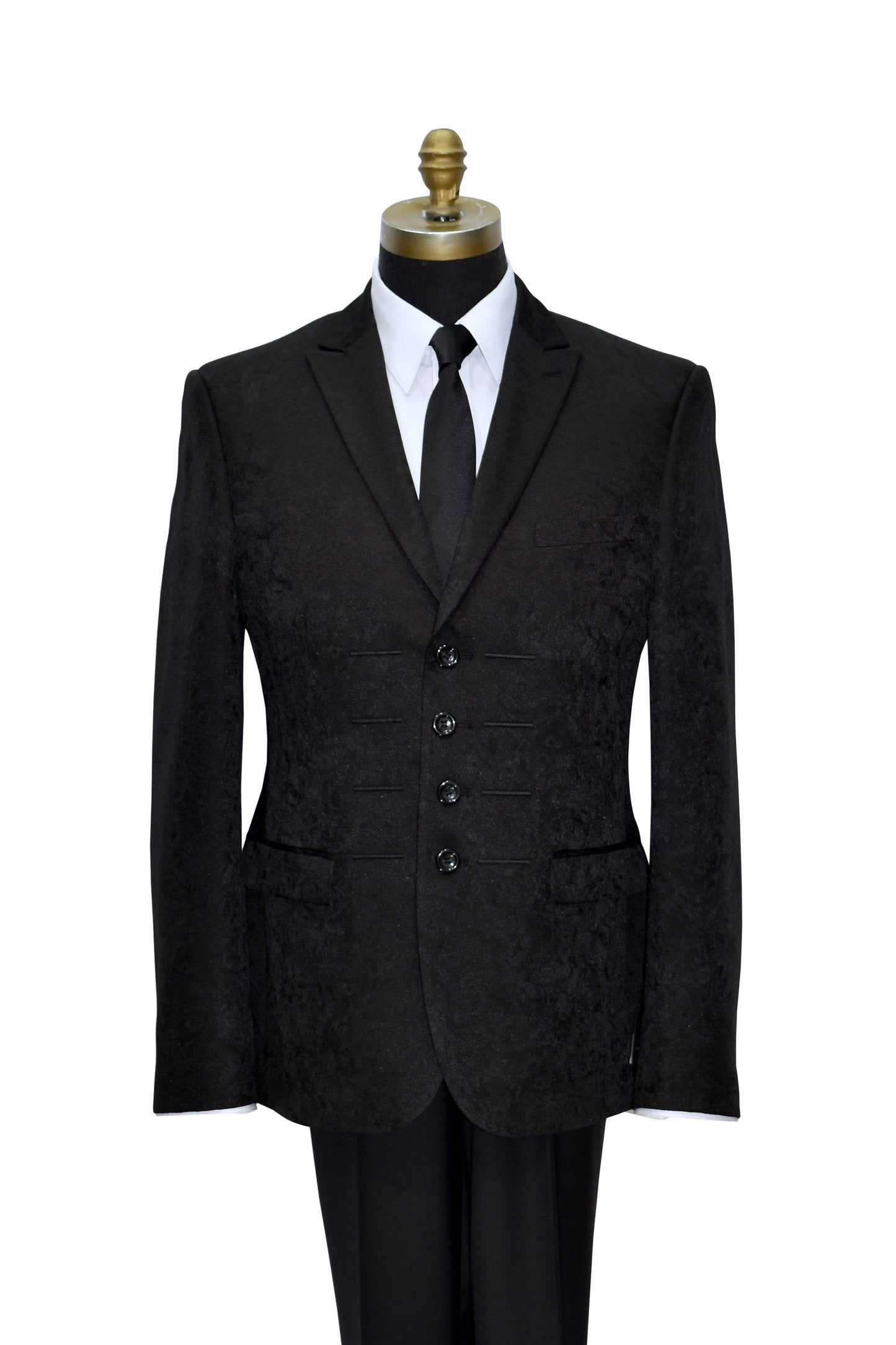 black brocade peak-lapel tuxedo on a mannequin against white background