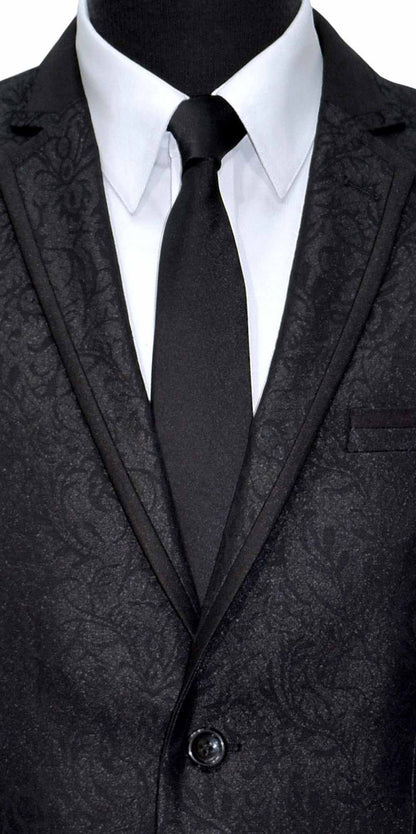 Black patterned suit jacket with a white shirt and black tie on a white background