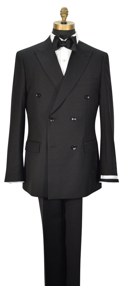 close-up mannequin wearing black double-breasted men's suit displayed on a mannequin torso with a white dress shirt, black bowtie, and black trousers. The jacket features peak lapels, six buttons, flap pockets, and super lightweight tropical wool.