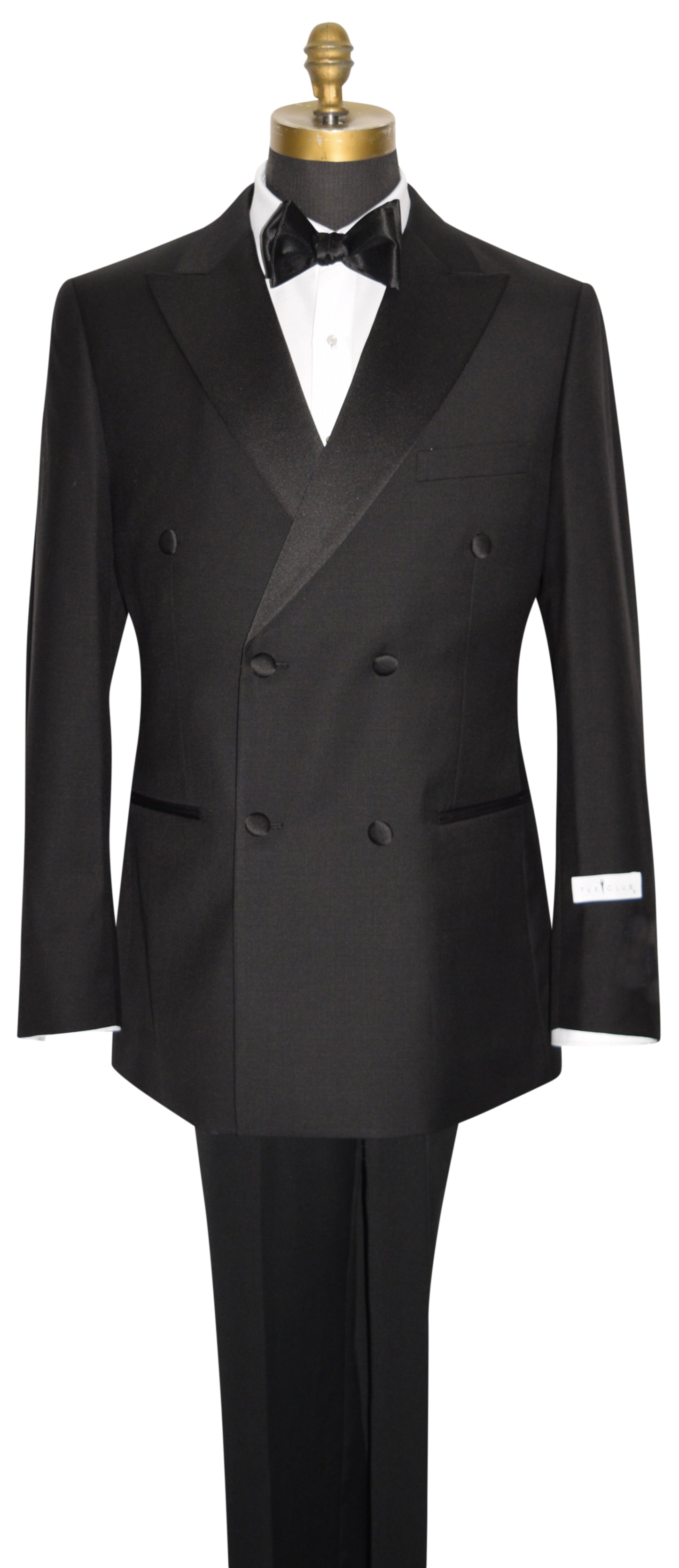 black double breasted tuxedo with bowtie against a white background