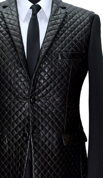 very close-up mannequin wearing a black tufted jacket with a white shirt and a long black skinny necktie against a white background