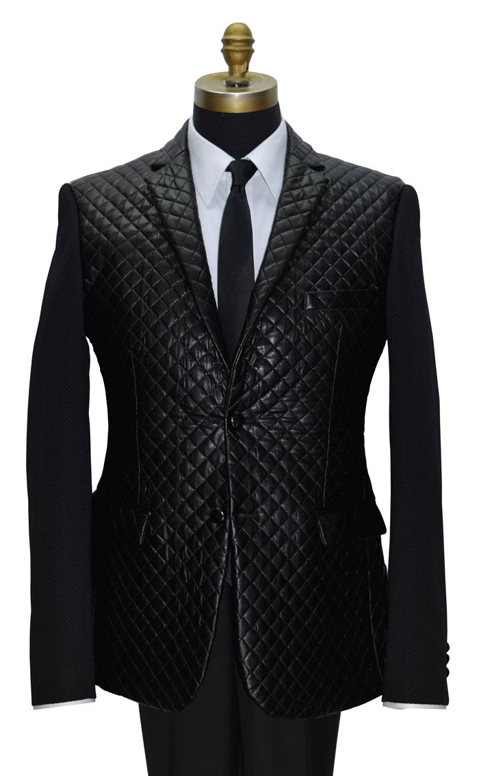 close-up life size mannequin wearing a black tufted jacket with a white shirt and a long black skinny necktie against a white background