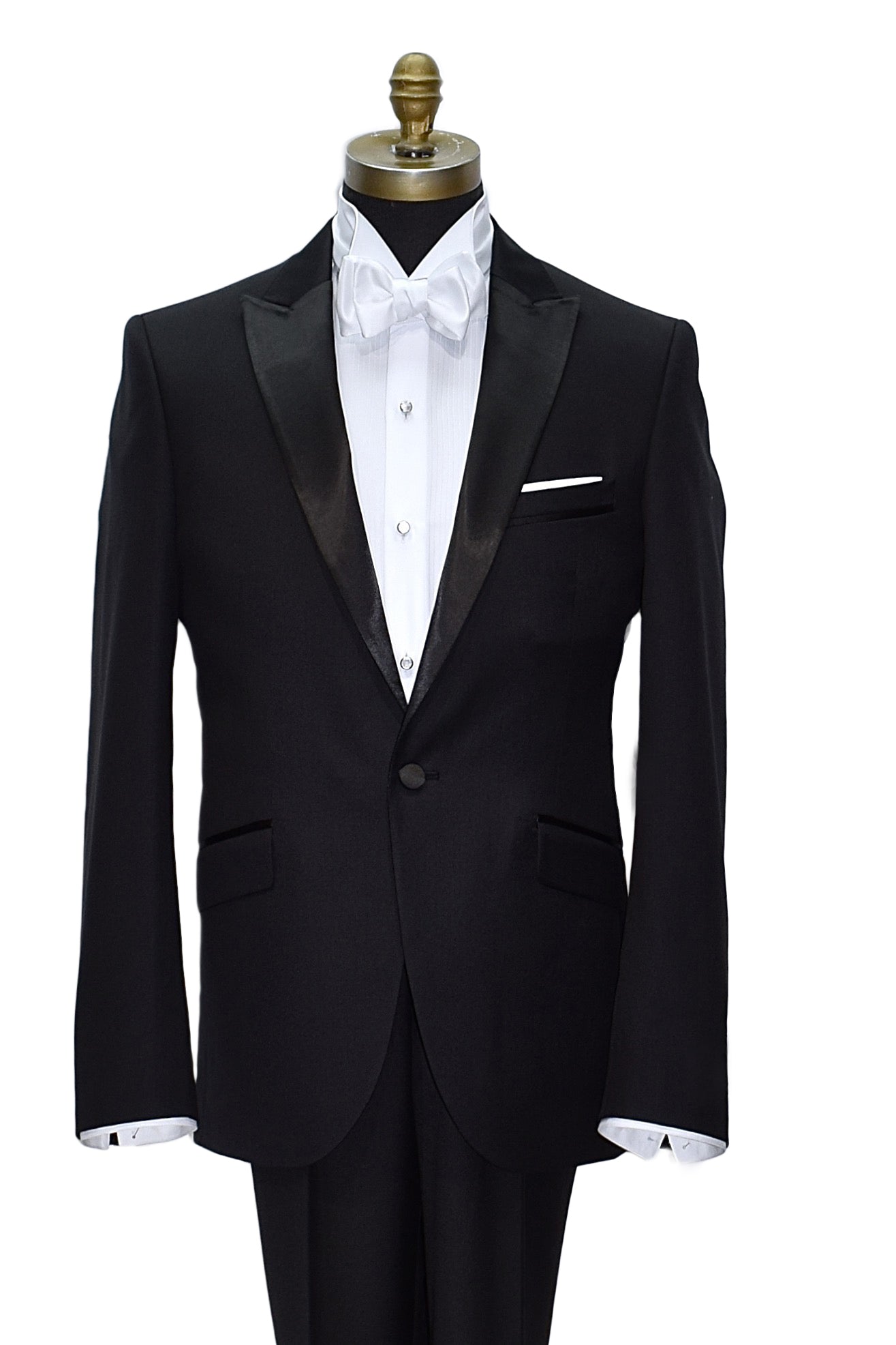 mannequin wearing black peak lapel tuxedo with mother-of-pearl studs and white wing collar tuxedo shirt and a white "tie-yourself" bowtie against a white background