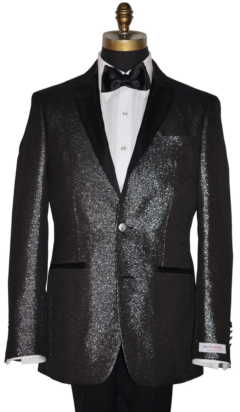 close-up black peak lapel tuxedo with shimmer on a mannequin with a "Dante Inferno" branded label on the sleeve against a white background