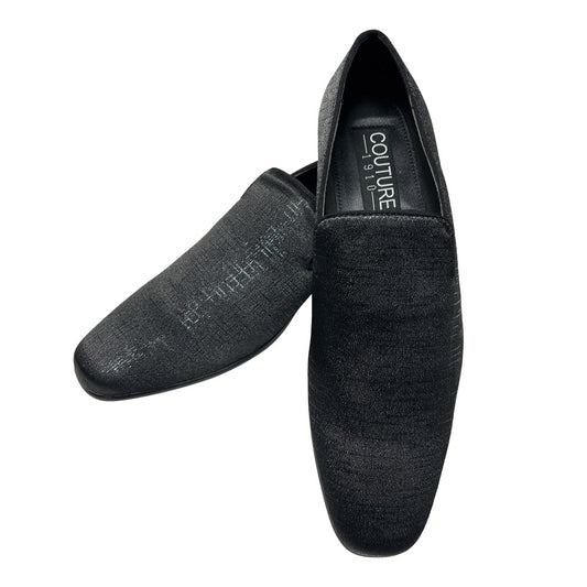 Black slip-on mens shoes with 'Couture' branding on a white background