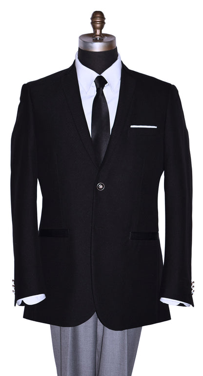 close-up mannequin wearing a black sports coat with a white dress shirt and black satin necktie with gray pants in-front of a white background