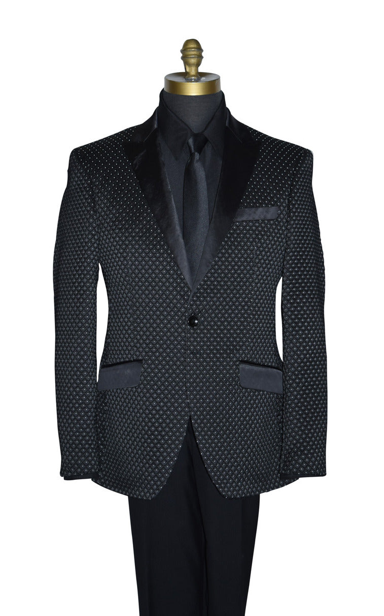 close-up Black tuxedo with white pin-dot wearing a black tuxedo shirt and long black necktie  on a mannequin against a white background