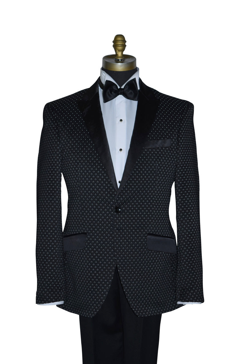 close-up Black tuxedo with white pin-dot on a mannequin against a white background