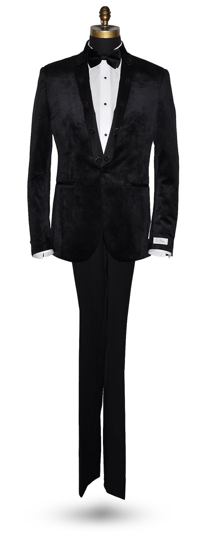 life size mannequin black velvet nehru tuxedo jacket worn with a black bowtie and black tuxedo pants against a white background