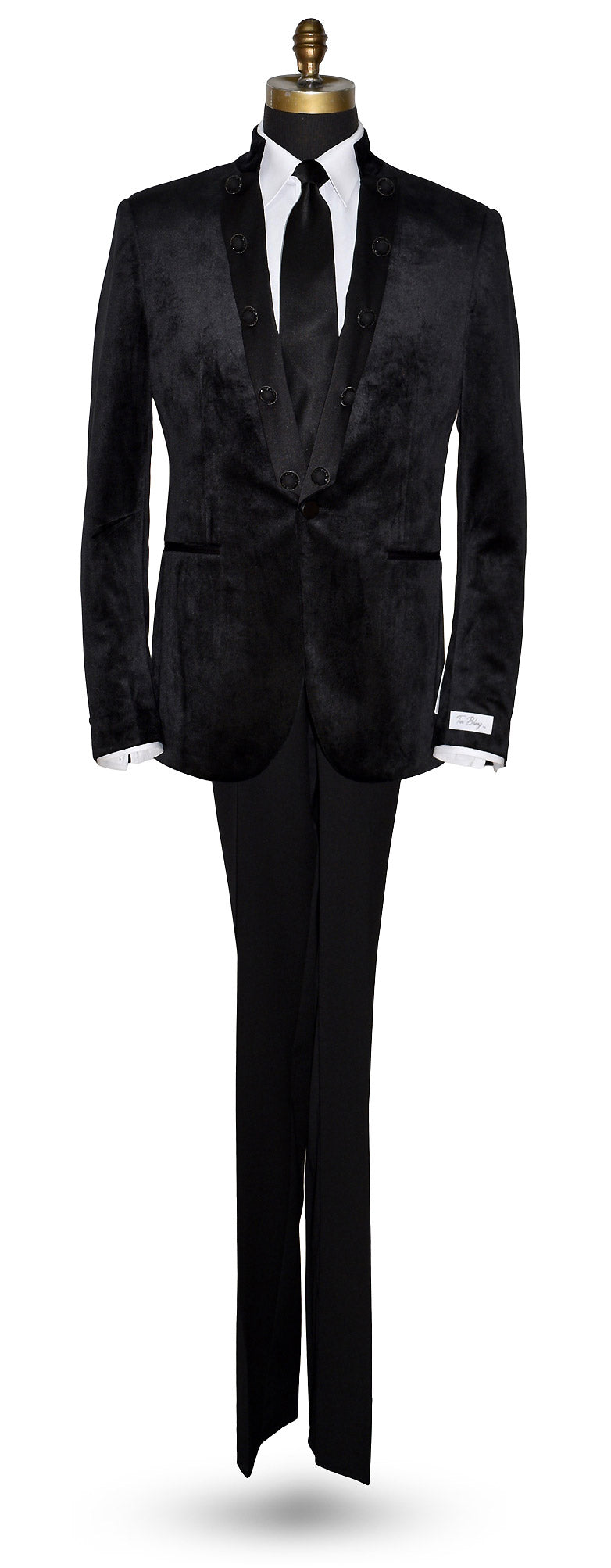 life size mannequin wearing a black velvet nehru jacket with long black necktie against a white background