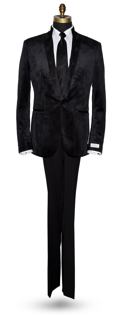 life size mannequin wearing a black velvet nehru jacket with long black necktie against a white background