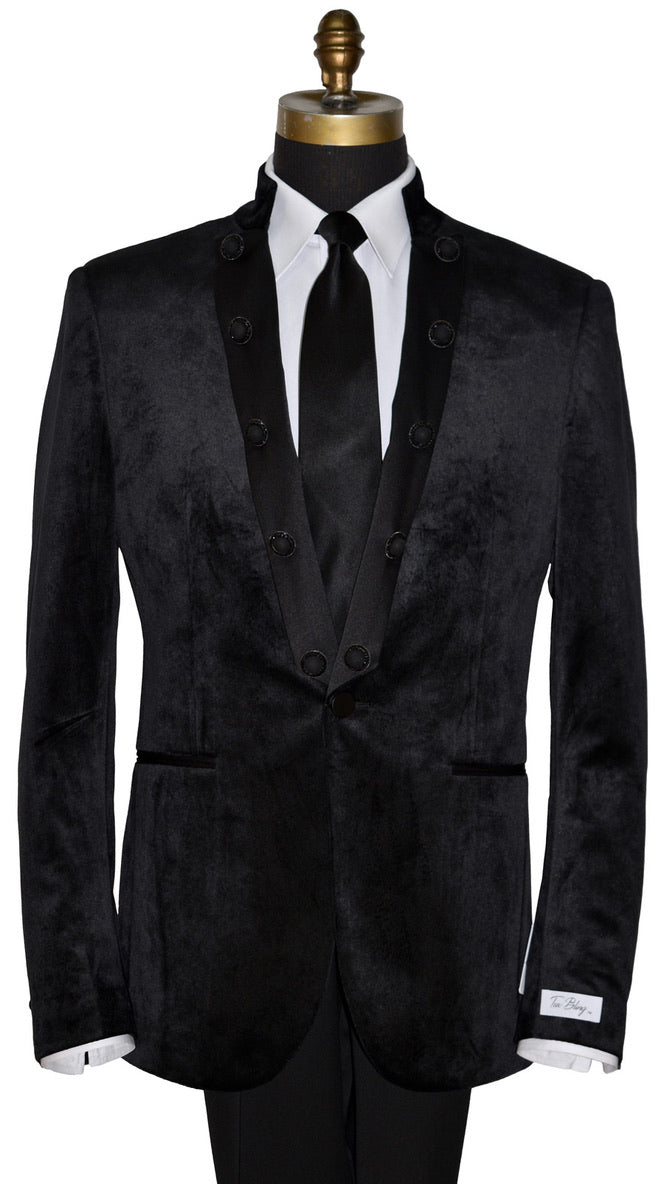 close up front view mannequin wearing a black velvet nehru jacket with long black necktie against a white background