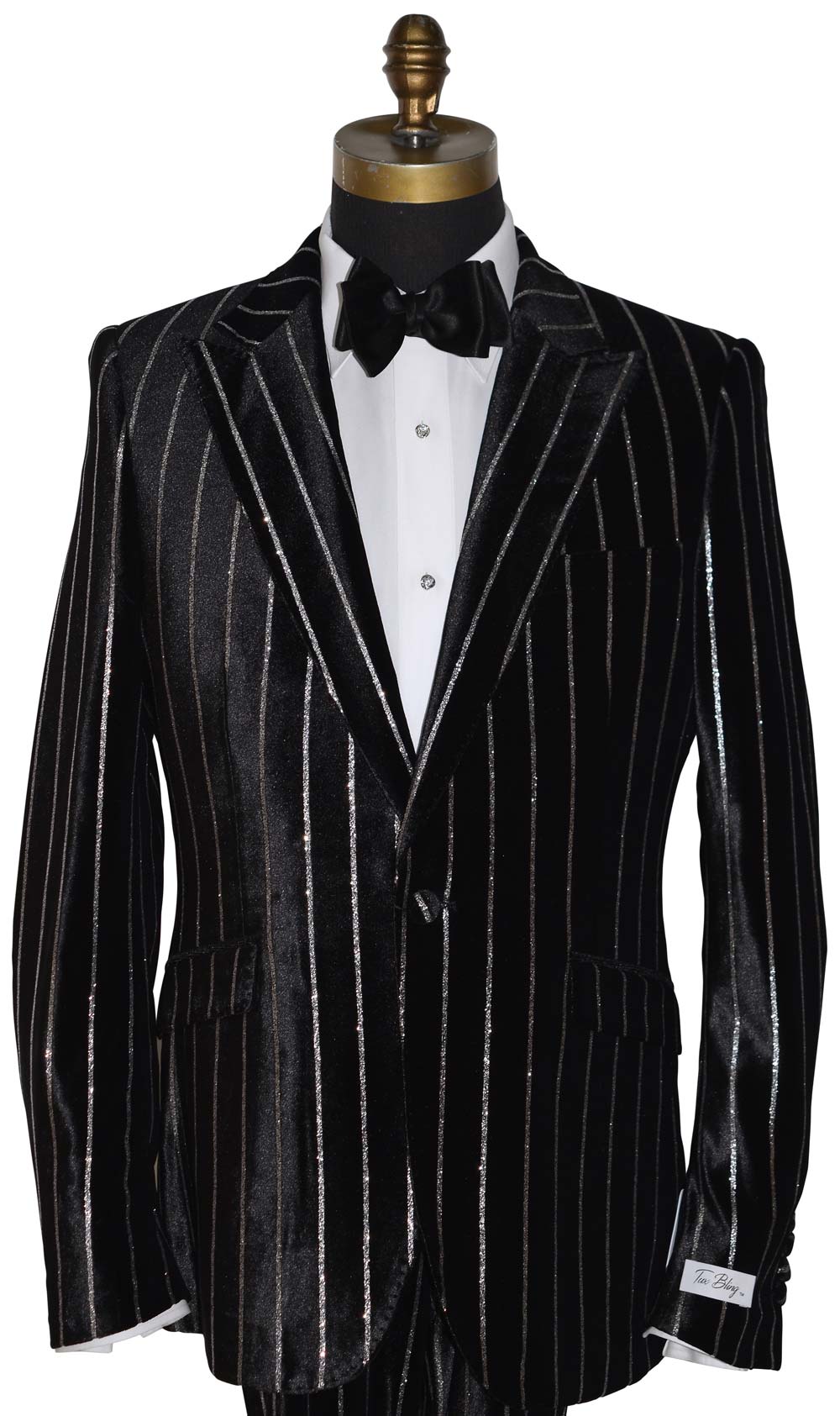 close-up black pinstripe suit with a black satin bowtie on a mannequin against a white background