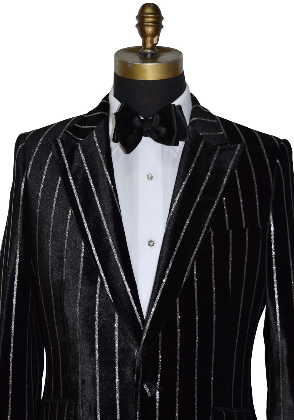 close-up back pinstripe suit on a mannequin with a white shirt and black bow tie.
