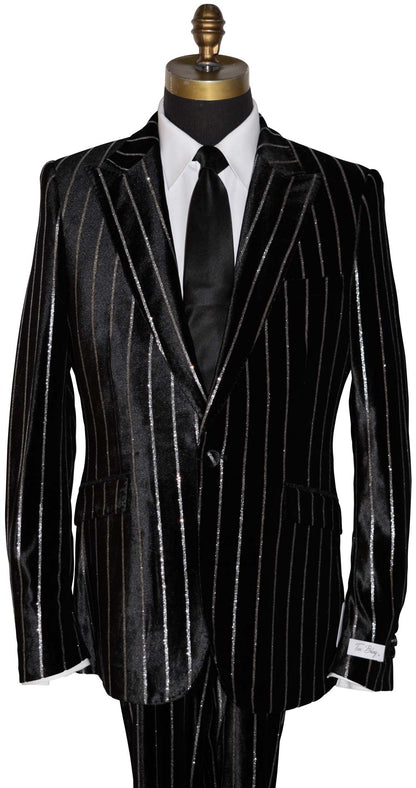 close-up mannequin wearing a black pinstripe suit on a mannequin with a long black necktie against a white background