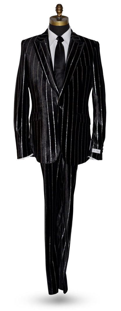 life size mannequin wearing a black pinstripe suit on a mannequin with a long black necktie against a white background