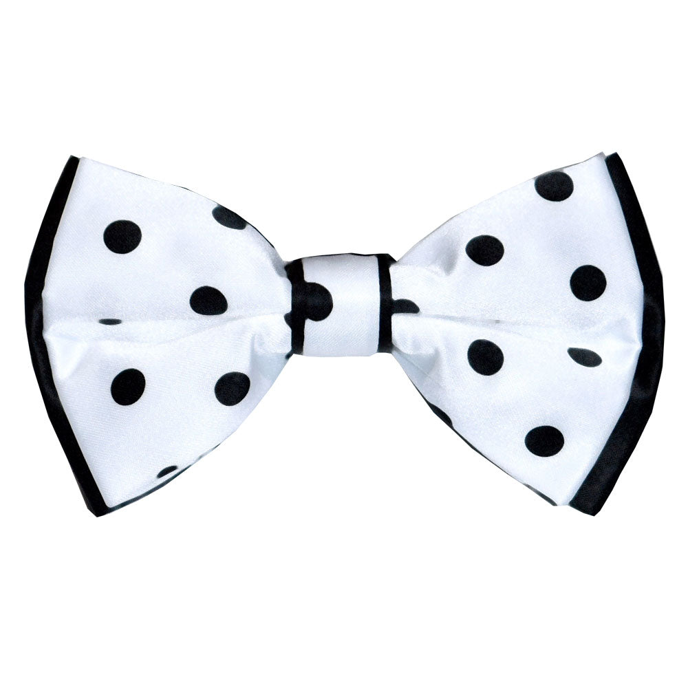 White bow tie with black polka dots on a white background