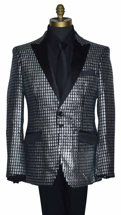 close-up silver and black tuxedo on a mannequin with a black tuxedo shirt and a long black necktie