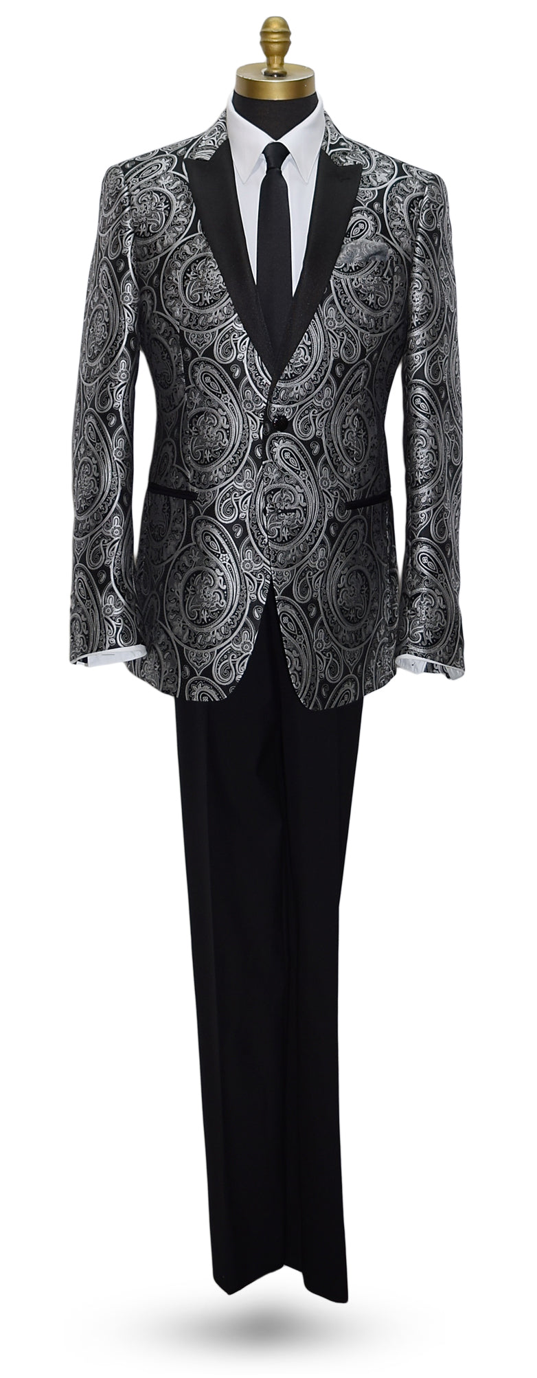 life size mannequin wearing a black tuxedo with silver paisley with black tuxedo pants and a black satin skinny necktie against a white background