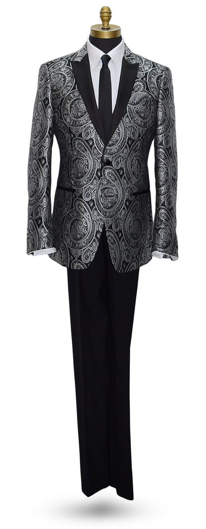 life size mannequin wearing a black tuxedo with silver paisley with black tuxedo pants and a black satin skinny necktie against a white background